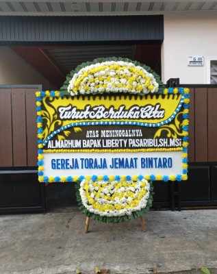 Papan Bunga Duka di Pasirlimus